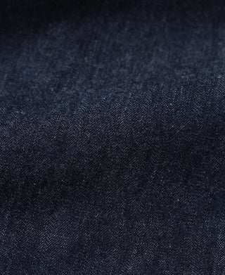 Indigo denim utility coverall jacket textured weave close-up