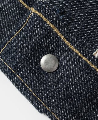 Indigo selvedge denim jacket, metal snap button on dark denim with yellow stitching
