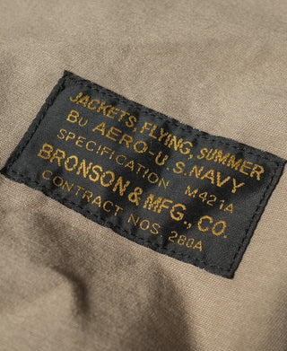 Khaki jacket inner neck label with text and spec details