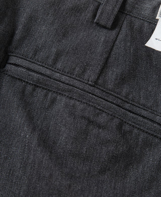 Dark gray chino trousers with stitched front crease detail