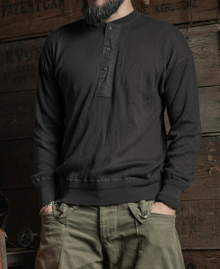 Black ribbed long-sleeve henley shirt with three-button placket