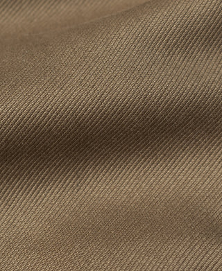 Khaki jacket fabric close-up with fine ribbed texture