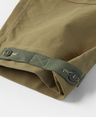 Khaki deck pants cuff with button tab and pleated fold