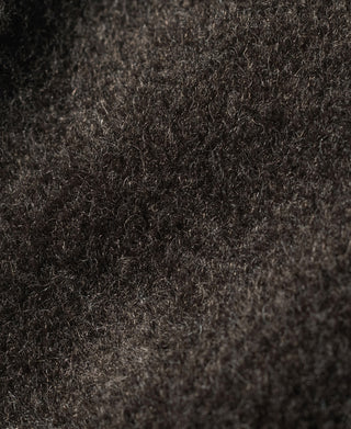 Olive flight jacket inner lining fabric texture close-up.