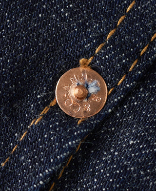Denim jacket metal snap button with circular emboss and orange contrast stitching