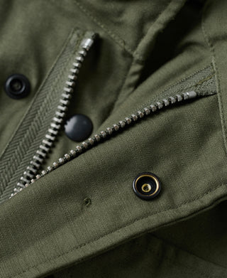 Olive field jacket front with zipper and button placket detail