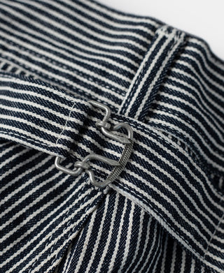 Striped carpenter pants with metal snap closure and reinforced workwear stitching