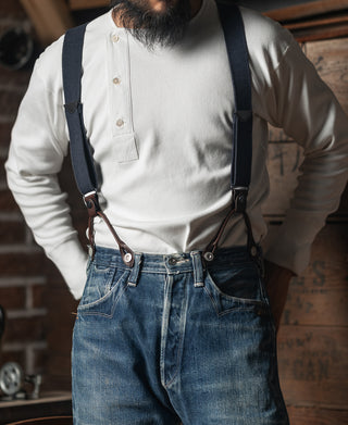 Navy X-back suspenders with leather ends and metal button clips