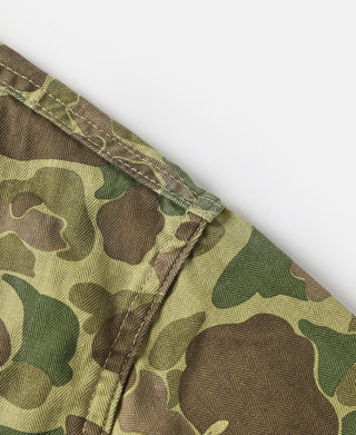 Camo jacket sleeve cuff detail with stitched hem and camo pattern.