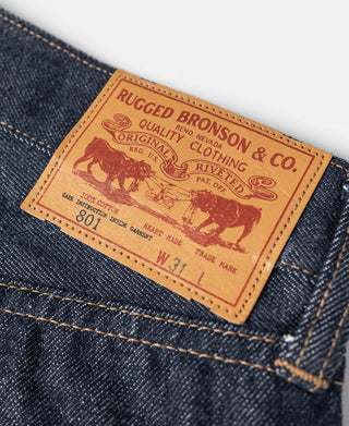 Denim jeans with leather-brand patch at waistband, Rugged Bronson & Co. label