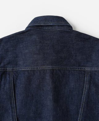 Indigo denim jacket back with curved yoke seam and collar
