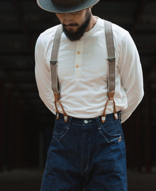 White long-sleeve henley shirt with button placket and long sleeves