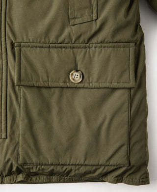 Olive parka chest pocket with button and stitched flap opening