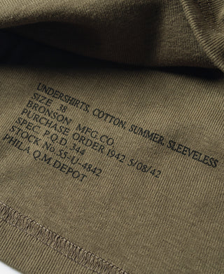 Olive cotton tank top inside label with size and care text