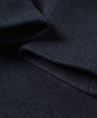 Navy peacoat shoulder and lapel seam close-up