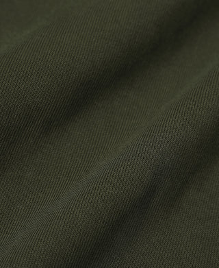 Olive long sleeve T-shirt knit fabric close-up