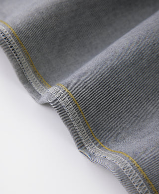 Selvedge denim jeans cuff edge with reinforced hem stitching and seam detail