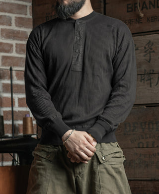 Black ribbed long-sleeve henley shirt, standing collar and button placket
