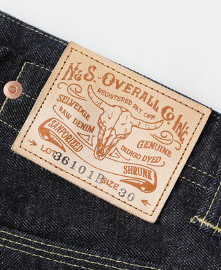 Indigo selvedge denim jeans leather brand label with “Overalls” text and sizing info