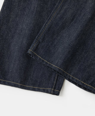 Indigo denim jeans front hem with contrast yellow stitching