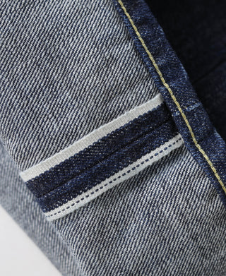 Selvage denim jeans waistband facing with striped stitching detail