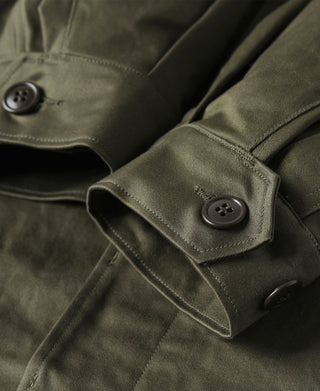 Olive field jacket with buttoned cuff and shoulder seam detail