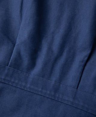 Blue cossack jacket interior lining panel and stitched seam