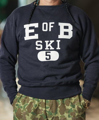 Navy crewneck sweater with white "E of B SKI 5" logo graphic
