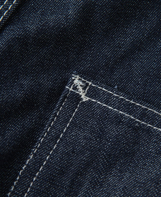 Indigo denim painter pants, side seam with bartack and reinforced stitching