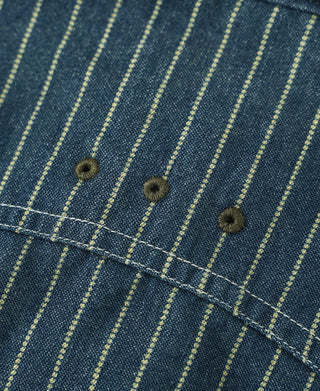 Indigo Wabash work shirt chest pocket with stitched flap and two dark buttons.