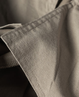 Khaki chino pants cuff with stitched hem and side fold