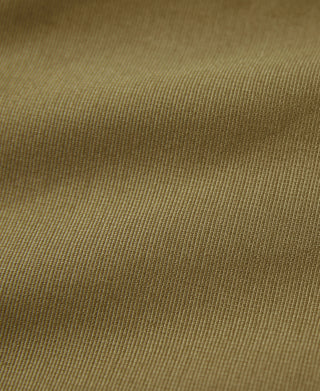 Khaki deck pants fabric close-up with fine woven texture