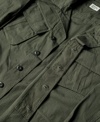 Olive tropical fatigue jacket front with chest pockets and buttoned flap details