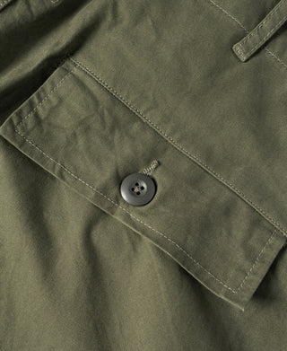Olive fatigue pants front with stitched cargo pocket and round button