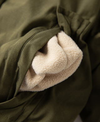 Olive parka hood lining with soft fleece trim