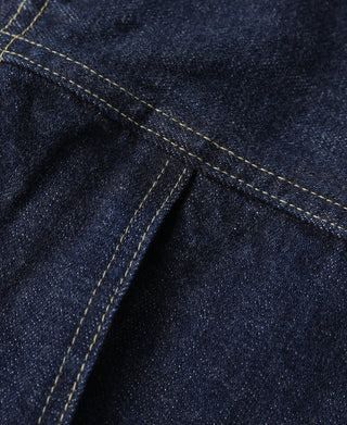 Indigo denim jacket seam detail with contrast yellow stitching