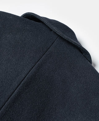 Navy peacoat shoulder and collar seam close-up