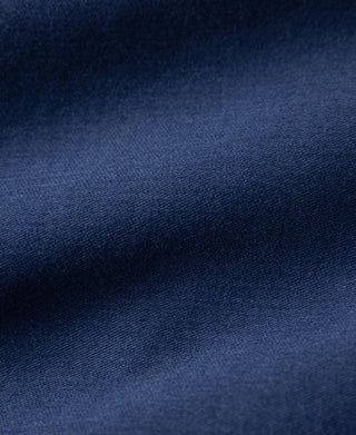 Blue moleskin cossack jacket fabric texture close-up