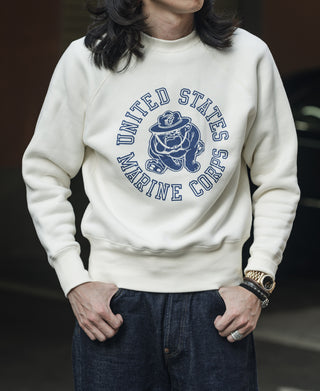 White raglan sweatshirt featuring blue devil dog “United States Marine Corps” logo.