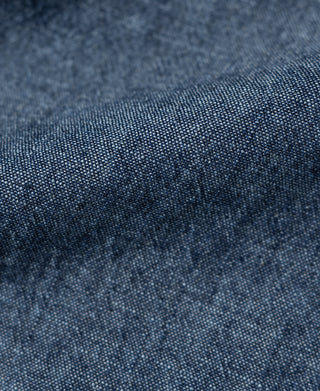Blue chambray cotton fabric texture with subtle slub weave detail