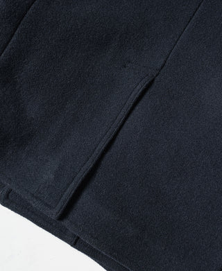 Navy peacoat sleeve cuff and hem edge close-up