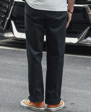 Black straight-leg work pants with clean front and ankle-length hem