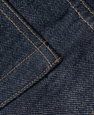 Denim jeans with double-stitched seam detail and contrast tan thread