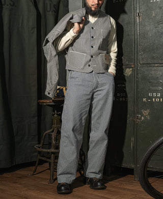 Men's pinstripe vest on model, button front and large patch pockets