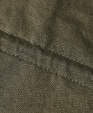 Olive field jacket stitched seam along hem edge