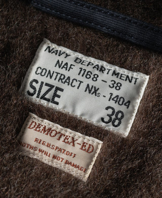 Navy deck jacket interior label with Navy Department contract and size 38