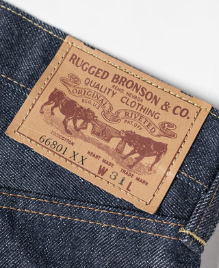 Rugged Bronson & Co leather patch on dark blue selvedge denim jeans, size W31 L33