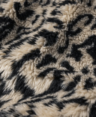 Leopard print sherpa-style deck jacket fleece with black pattern