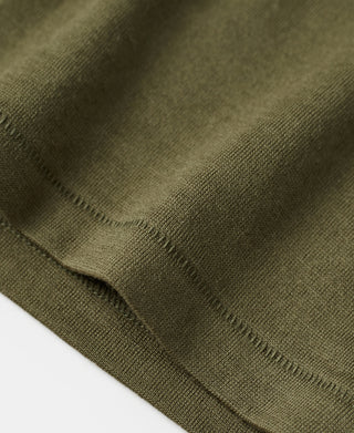 Olive wool knit shirt sleeve hem with ribbed cuff