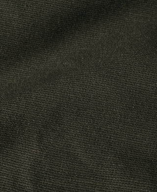 Dark gray-green jacket fabric texture close-up, woven pattern